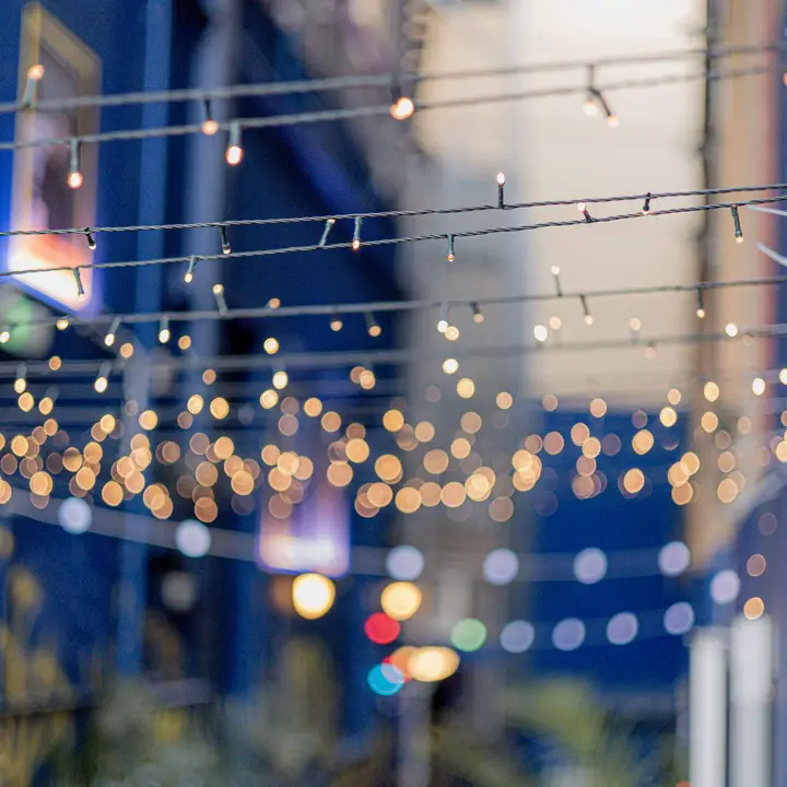 Festoon lights in the laneway