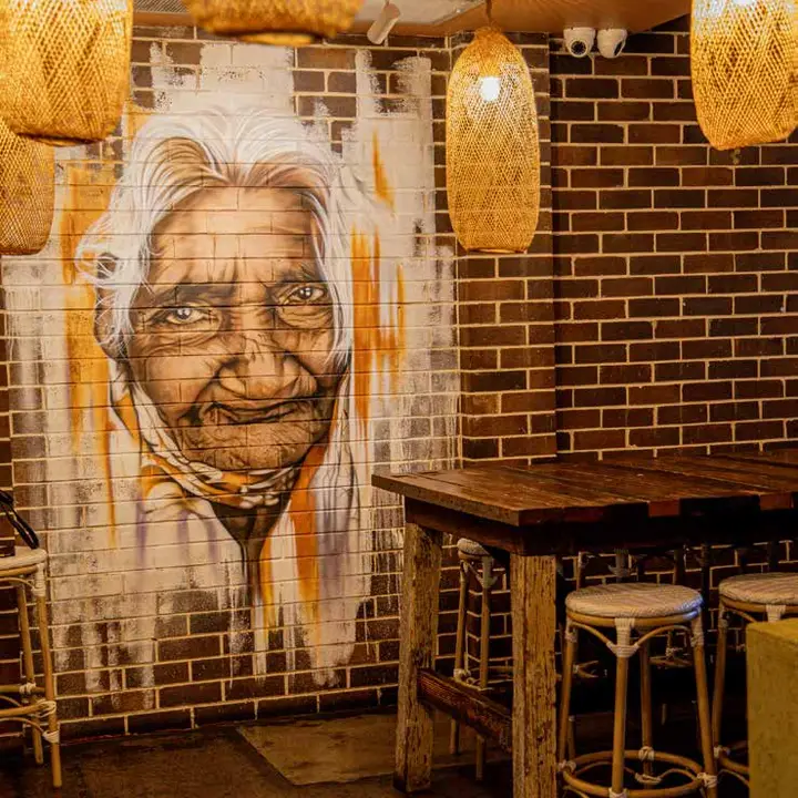 High table beside the mural