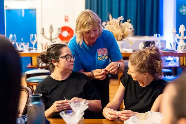 Learning to fold dumplings around the table